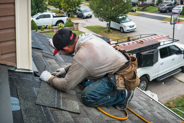 Professional Flat Roof Repair technician working in Clinton, WA